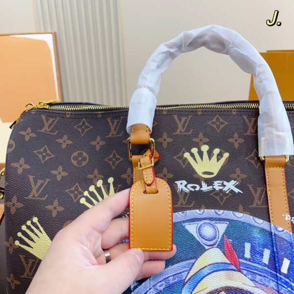 LOUIS VUITTON X ROLEX 1995 KEEPALL 45 PINOCCHIO HAND BAG - Image 9