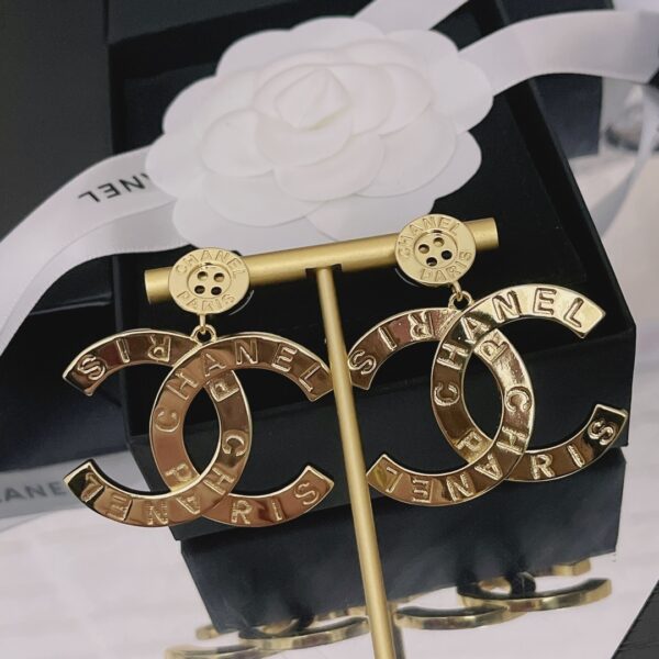 CHANEL PARIS BUTTON EARRINGS - Image 9