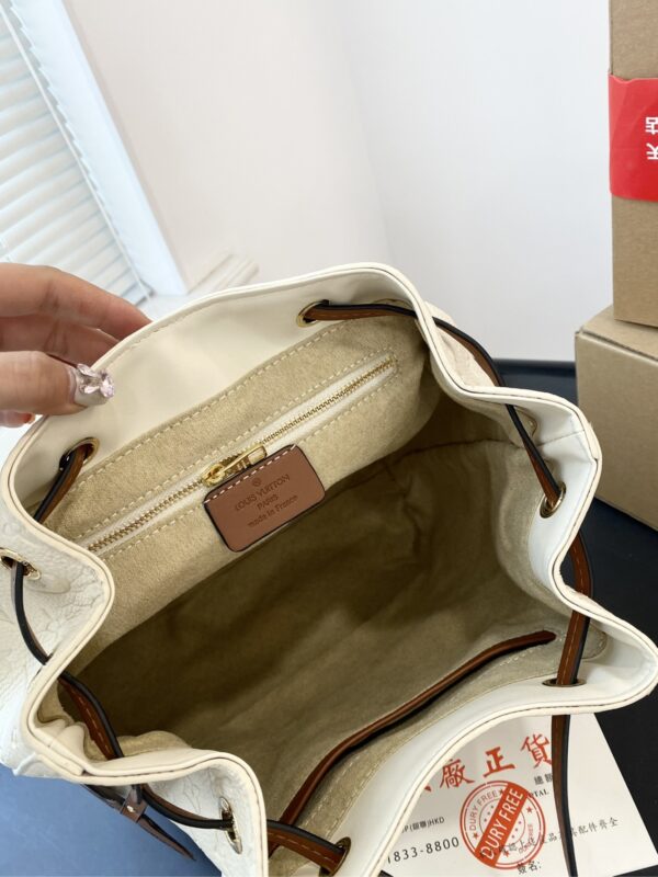 LOUIS VUITTON MONTSOURIS BACKPACK EMPREINTE WHITE AND BROWN 25CM - Image 2