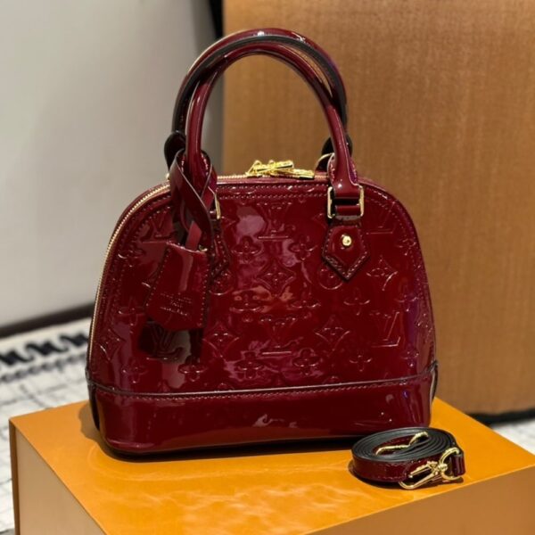 LOUIS VUITTON ALMA BB MONOGRAM VERNIS LEATHER DARK RED 23CM - Image 2