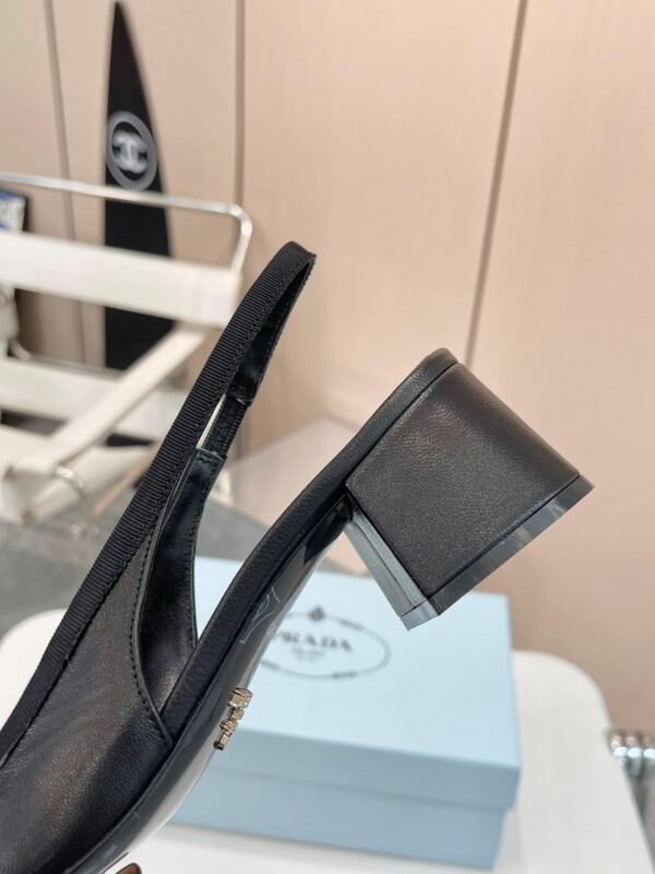 PRADA TRIANGLE LOGO BOW SLINGBACK PUMP IN BLACK - Image 7