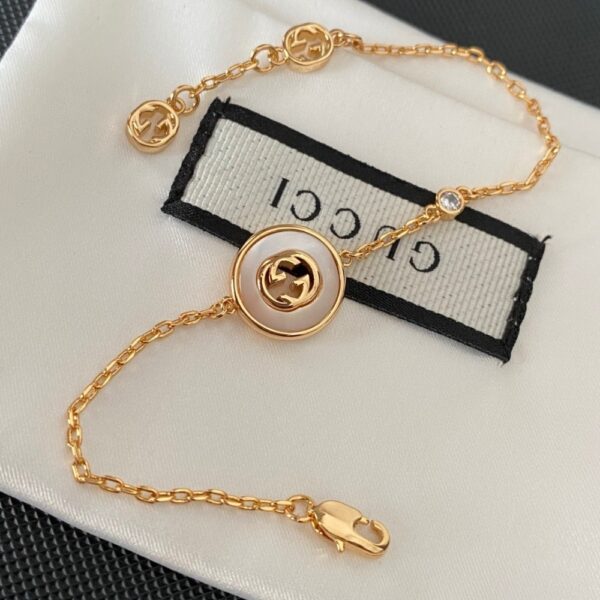 GUCCI INTERLOCKING GG BRACELET GOLD TONE 786749 J85I0 8070 - Image 5
